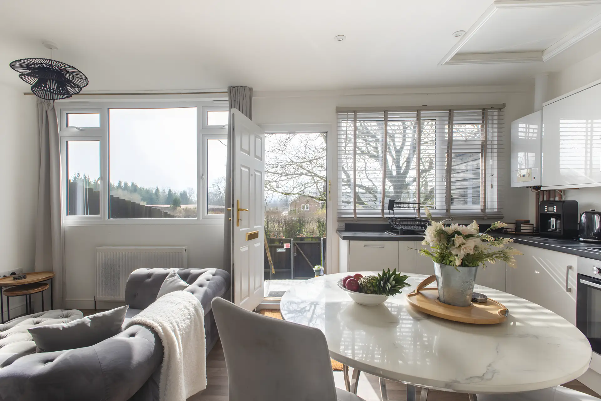 Bright holiday home living room with large windows