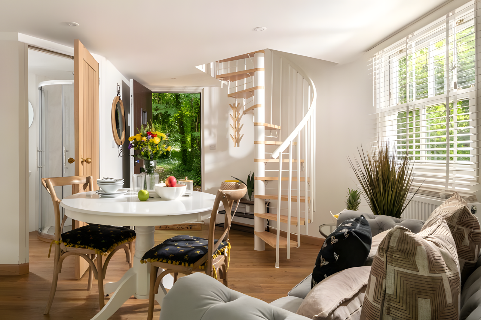 Bright holiday accommodation interior with garden views